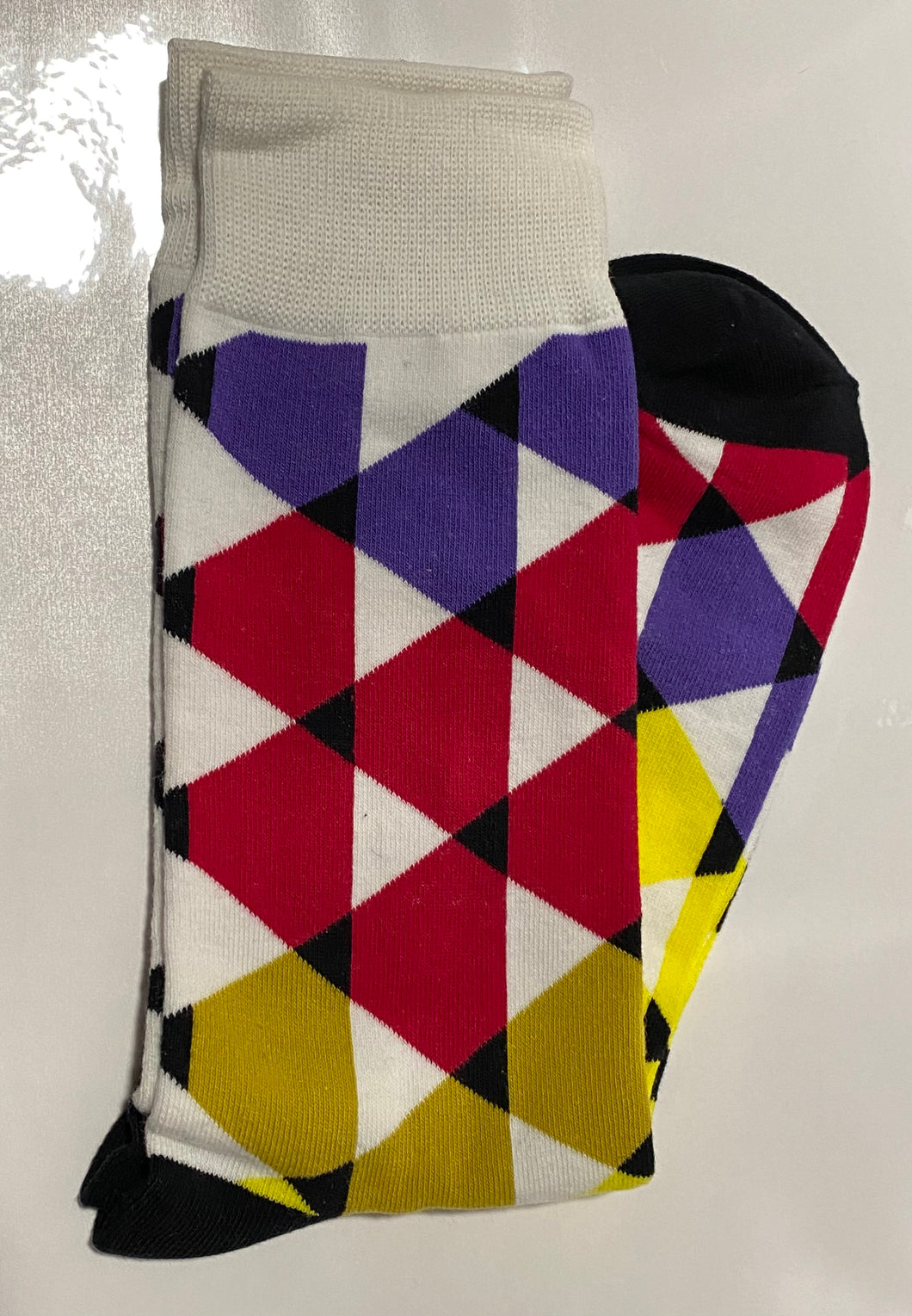 Multi colored abstract triangles socks