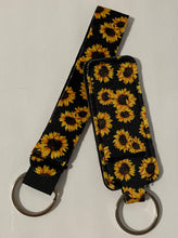 Load image into Gallery viewer, Chapstick holder and keychain- black sunflower 🌻
